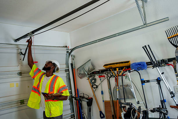 Professional Garage Door Maintenance technician working in Leavenworth, KS